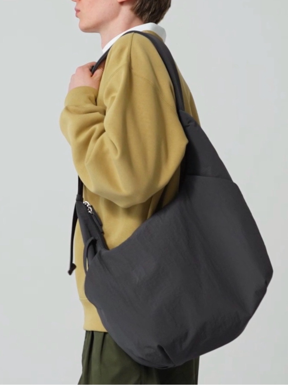 Uniglo GU Cocoon sling bag black nwt faux leather
